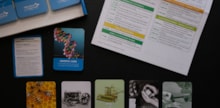 Over top view of Innovation Timeline kit materials, including cards, teacher guide and box