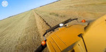 Tractor driving on farm