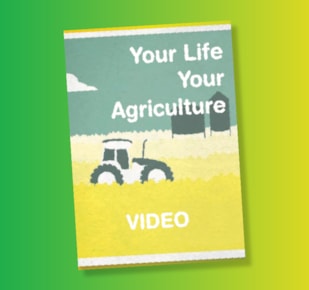 Your Life Your Agriculture Graphic with tractor in field with silos
