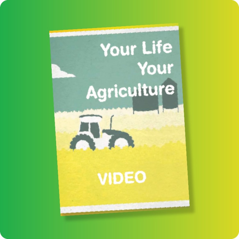 Your Life Your Agriculture Graphic with tractor in field with silos