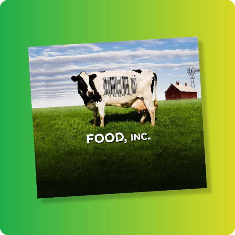 Food Inc text on image of beef cow with barcode in farm field with red barn in the background 
